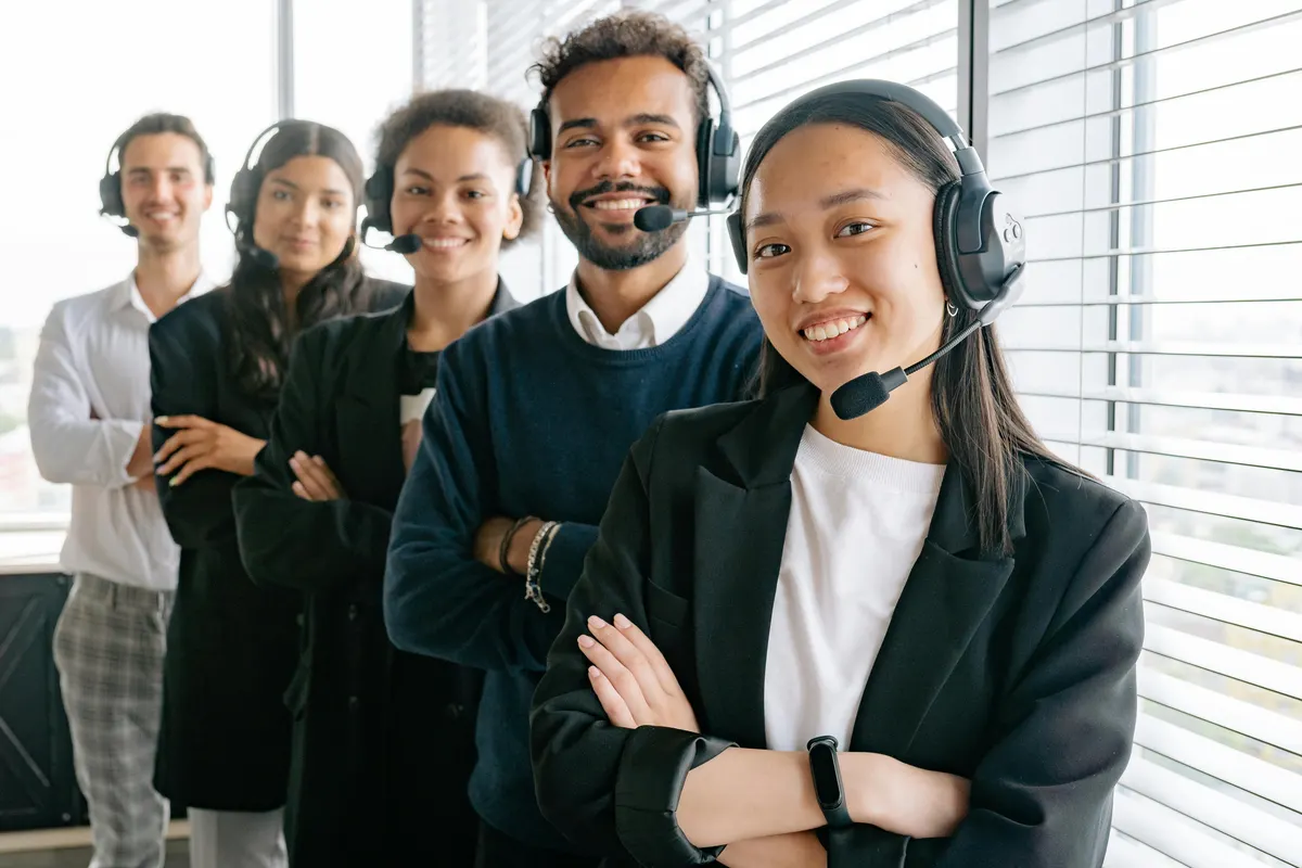 An insurance customer service representative on a call at a computer